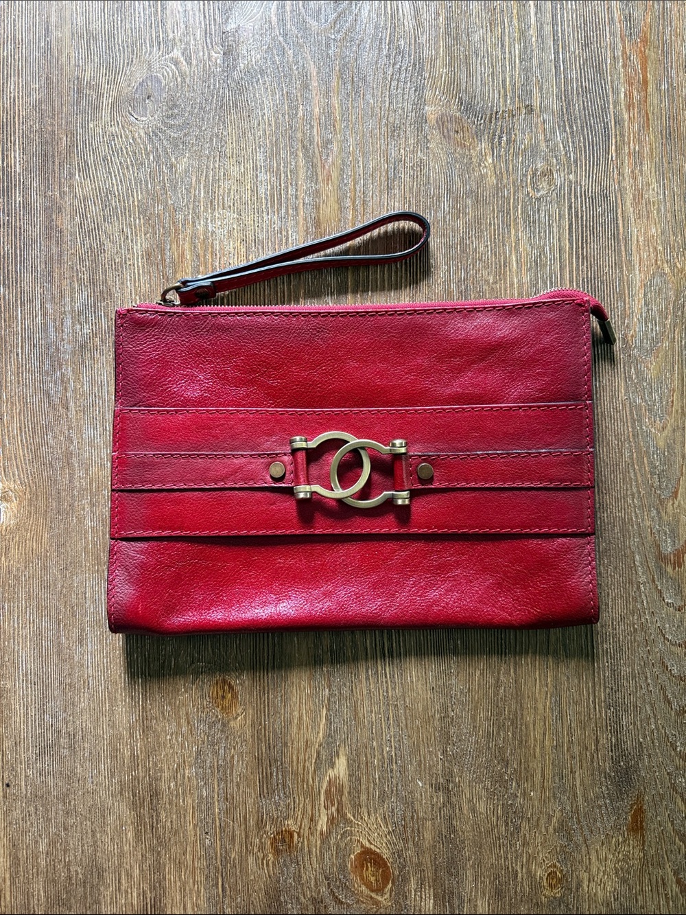 Red Leather Wristlet Clutch with Decorative Gold Accent